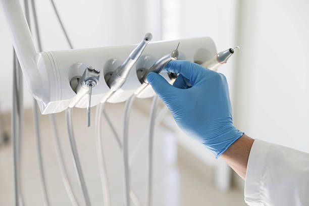 Professional Emergency Dentist technician working in St. Joseph, IL